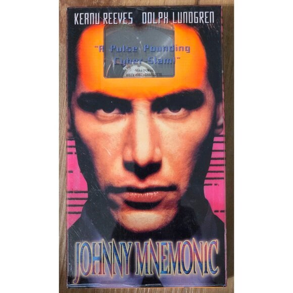 Johnny Mnemonic (VHS, 1995) Columbia Tristar Orange Tape Keanu Reeves Cyberpunk - Picture 1 of 5